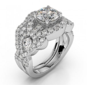 A ring from Amden Jewelry’s Glamour collection showcases swirling and overlapping rows of accenting diamonds