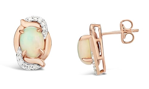 A pair of rose gold stud earrings with prong-set opals from LeVian.