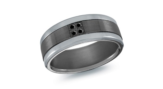 a men’s tantalum wedding band featuring four black diamond accents