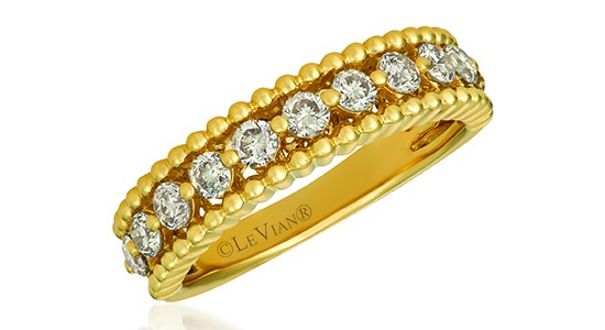 A yellow gold stackable fashion ring with round cut diamonds from Le Vian, available at Morgan Jewelers.