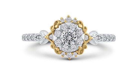 a mixed metal halo engagement ring with yellow gold flourishes