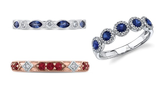 Three different gemstone wedding bands— two featuring sapphires, one featuring rubies, available at Morgan Jewelers.