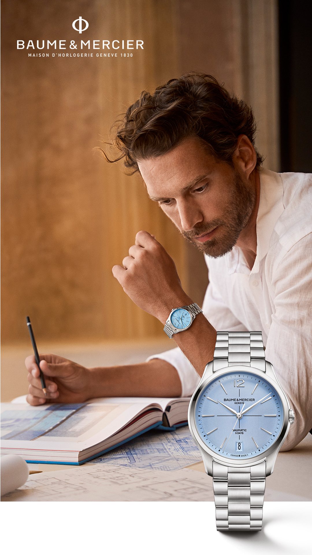 A hand with a watch on the wrist with text Baume and Mercier.