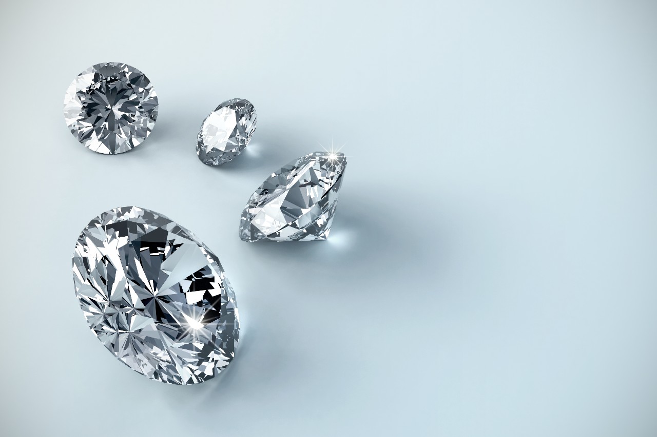 Two oval diamonds and two round diamonds